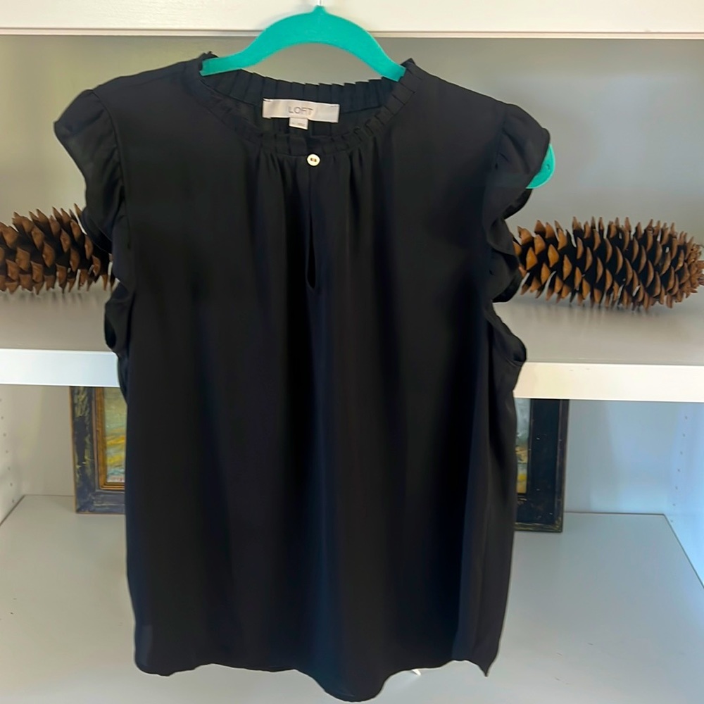 LOFT Beautiful black blouse with ruffle sleeves and neck. Size large.